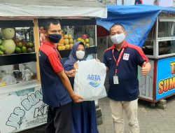 Bersama AQUA, Alfamidi Cabang Bitung Bagikan ‘Protection Package” Kepada Pedagang UMKM